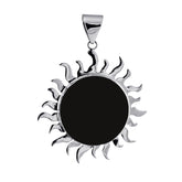 Handcrafted sterling silver sunburst pendant with polished black shell center, elegant Bali artisan jewelry.